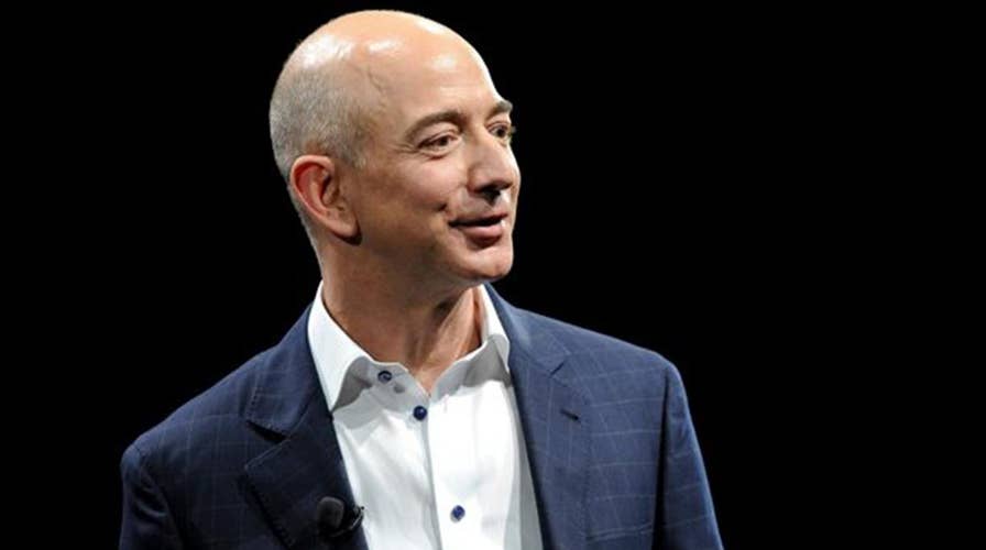 Jeff Bezos accuses National Enquirer's publisher of blackmail and extortion