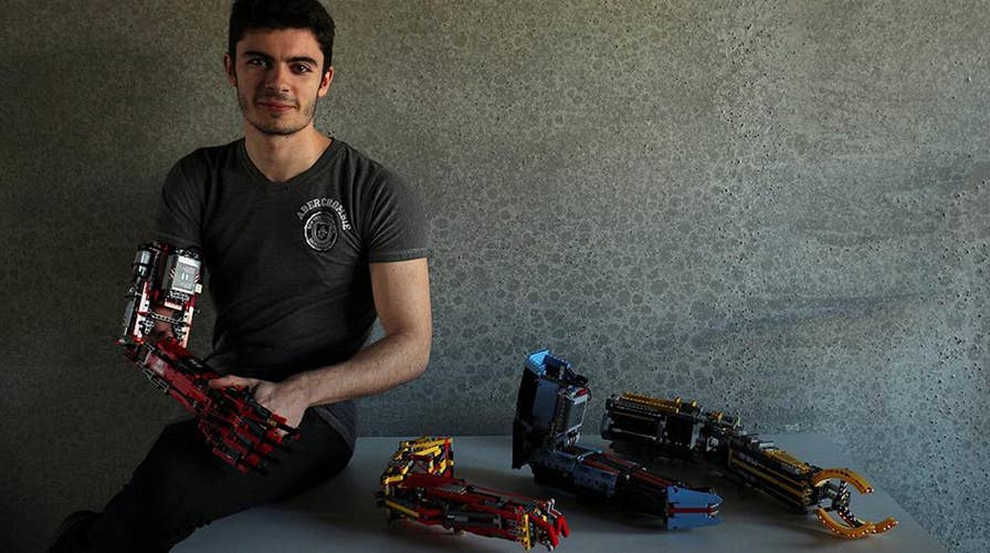 Teen builds his own prosthetic arm out of LEGO bricks