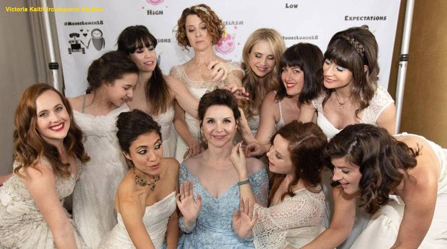Bride invites her bridesmaids and guests to wear their own wedding gowns to her nuptials
