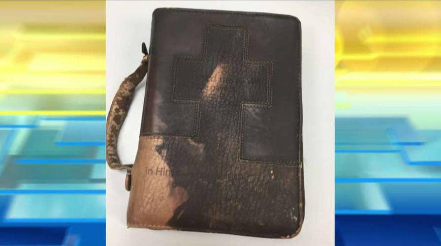 Firefighters brought to tears after Alabama veteran's Bible survives devastating home fire