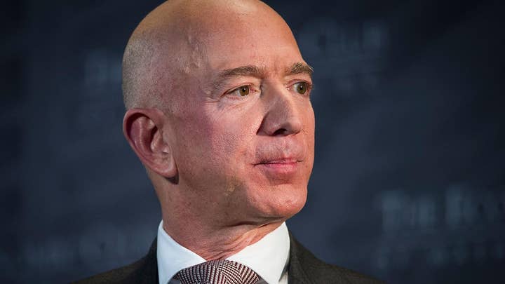 Jeff Bezos' accusations of blackmail against National Enquirer's publisher spark behind the scenes battle