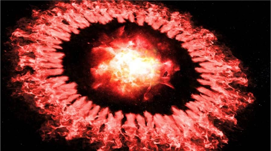 Cosmic dust survives obliteration in massive red supernova, NASA shows ...