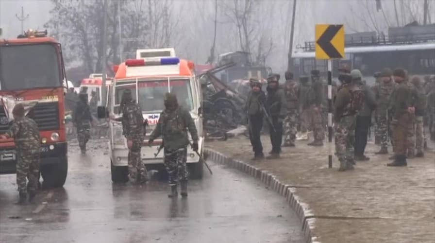 Deadly car bomb attack on an Indian military convey kills dozens in India-controlled Kashmir