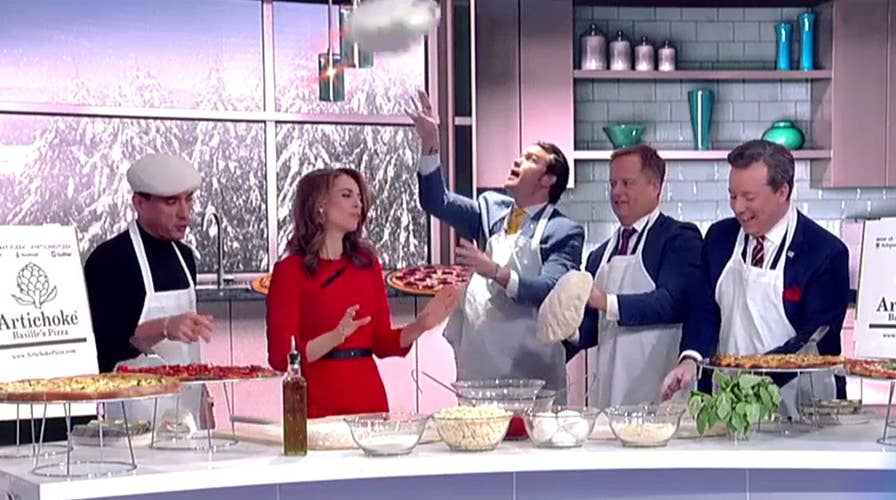 Artichoke Pizza co-founder Francis Garcia helps the 'Fox & Friends' team celebrate National Pizza Day