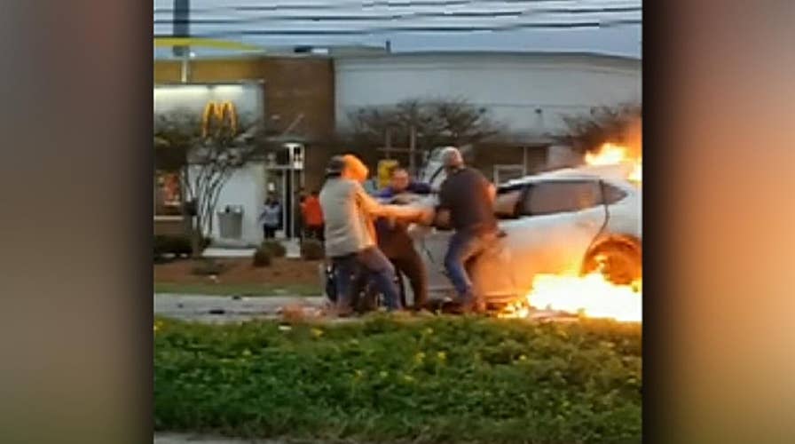 Brave bystanders pull woman through window of burning car in Louisiana