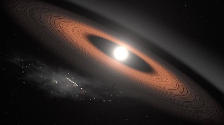 Scientist finds ancient star with mysterious rings circling it