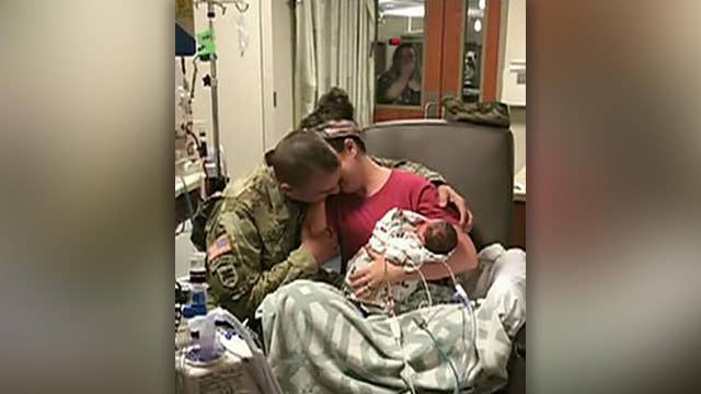 Emotional reunion: Kansas soldier surprises wife, newborn twins at hospital