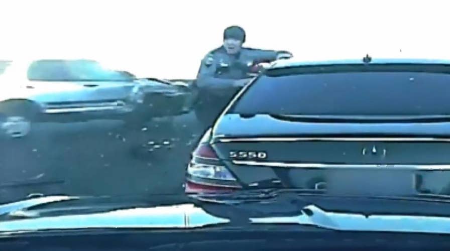 Dash cam footage shows trooper narrowly avoid accident after a suspected DUI driver crashed into his cruiser