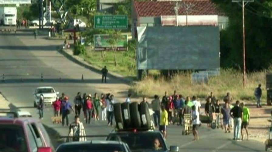 Venezuela facing new unrest after Maduro closes border with Brazil.