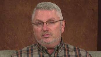 Kentucky man held at gunpoint for wearing a MAGA hat speaks out