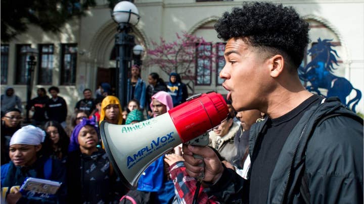 Students stage walkout to protest school’s dress code ban on do-rags