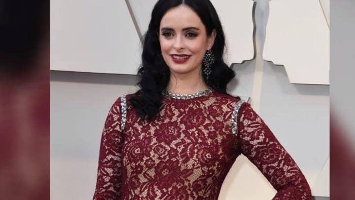 'Jessica Jones' star Krysten Ritter debuts her baby bump on the Oscars red carpet