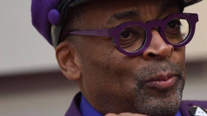 Spike Lee issues call to action for 2020 presidential election in Oscars speech.