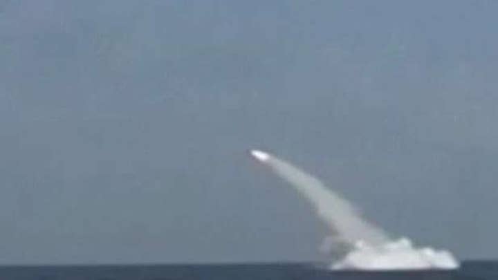 Iran claims successful submarine launch of cruise missile