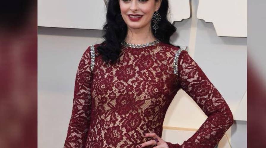 'Jessica Jones' star Krysten Ritter debuts her baby bump on the Oscars red carpet