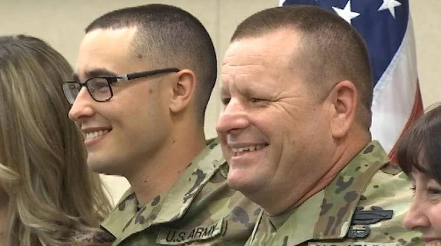 Army father and son deployed together overseas on mission in Afghanistan