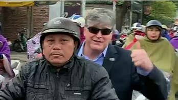Sean Hannity commutes to set via scooter in Vietnam