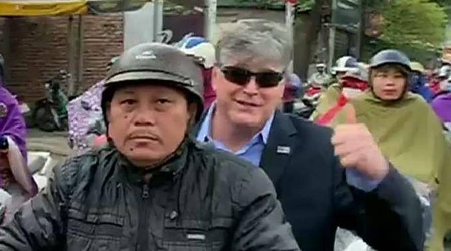 Sean Hannity commutes to set via scooter in Vietnam