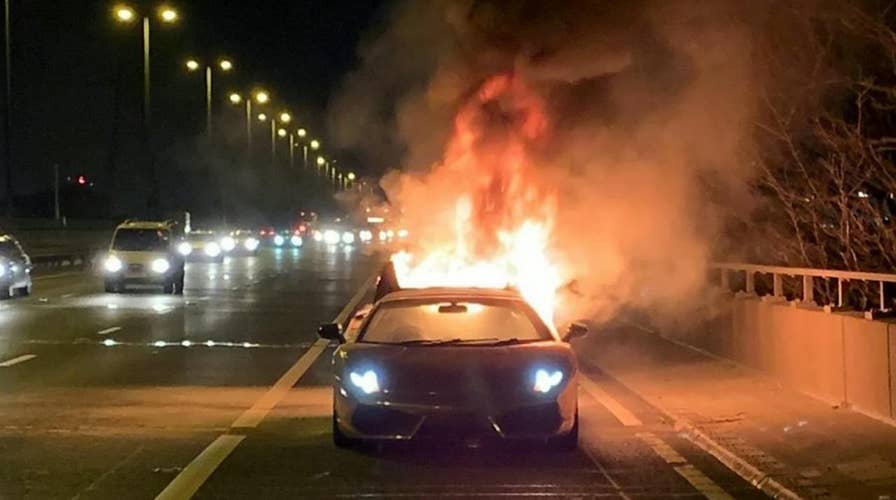 $150,000 Lamborghini bursts into flames moments after leaving garage