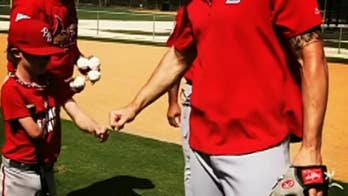 With one arm, 8-year-old swats homer at Cardinals spring training