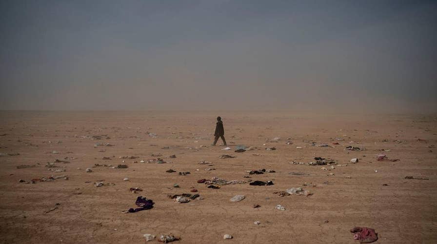 Mass grave with dozens of decapitated bodies found in last ISIS enclave: 'They were slaughtered'