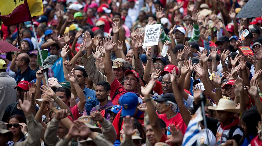 Venezuela power struggle takes on Cold War overtones as U.S., Russia stand on opposite sides.