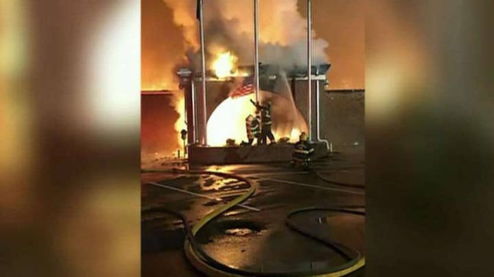 Virginia firefighters save American flag flying outside burning building