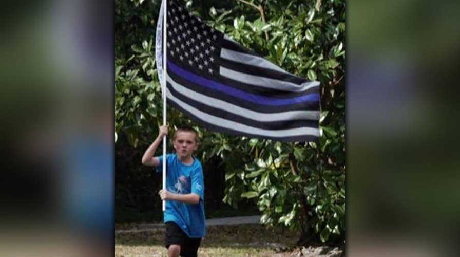 10-year-old pledges to run 150 miles to raise money for fallen officers