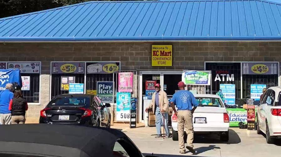 Act of kindness pays off as lotto winner collects $1.5 billion