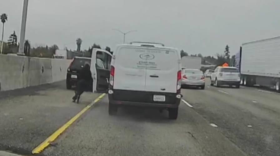 Wads of cash thrown over California freeway