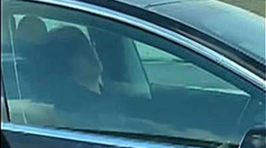 Man caught sleeping behind the wheel of his Tesla as it drives down a busy highway