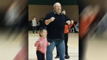 Tennessee man cheers up nervous granddaughter with Chicken Dance at cheerleading contest
