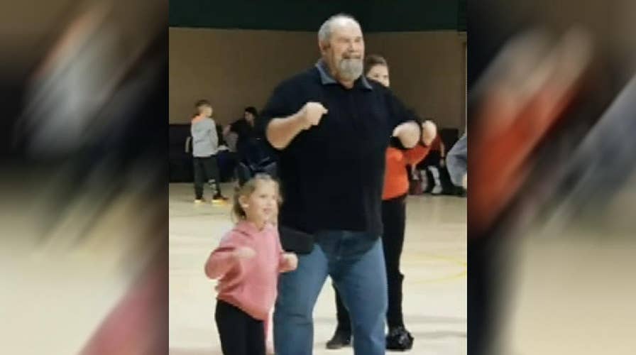 Raw video: Tennessee girl dances with her grandfather for school competition