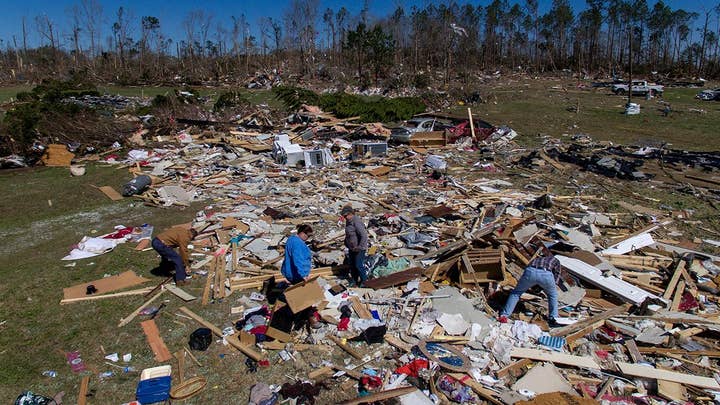President Trump heads to Alabama to tour disaster areas, meet with first responders and tornado victims