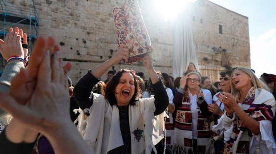 Clash at the Western Wall between thousands of young ultra-Orthodox Jews and a liberal Jewish women's group