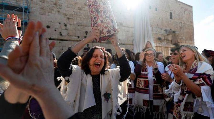 Clash at the Western Wall between thousands of young ultra-Orthodox Jews and a liberal Jewish women's group