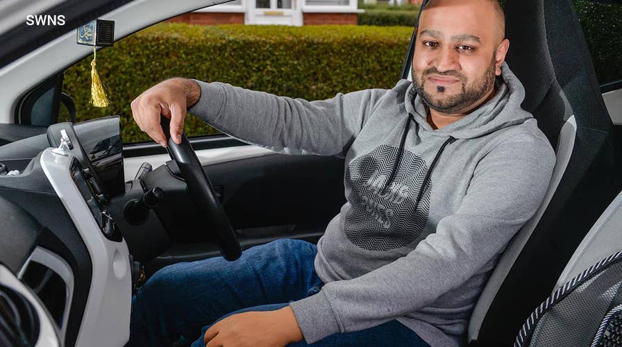One-armed driving instructor teaches stick-shift skills