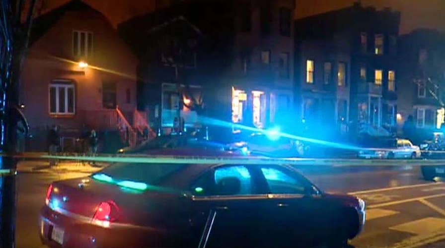 A Chicago police officer is in critical condition after being shot while serving a warrant