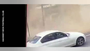 Watch: Lucky moment a man narrowly avoids being crushed by collapsing roof