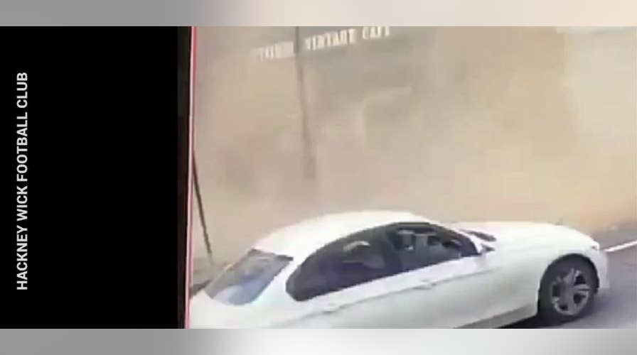 Watch: Lucky moment a man narrowly avoids being crushed by collapsing roof