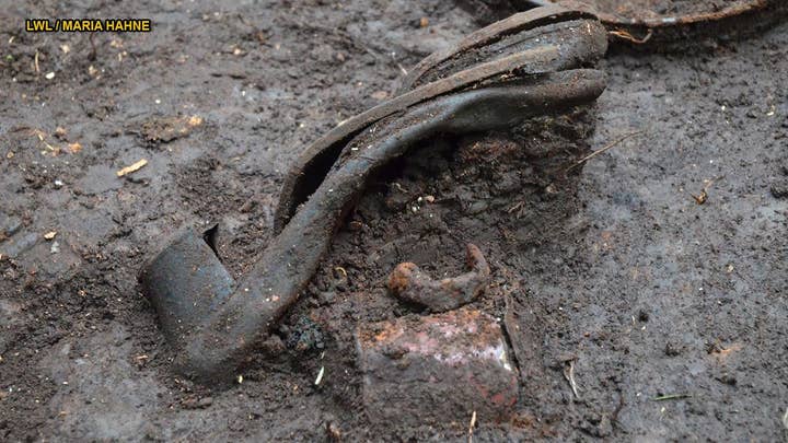 Hundreds of chilling items discovered at Nazi massacre sites