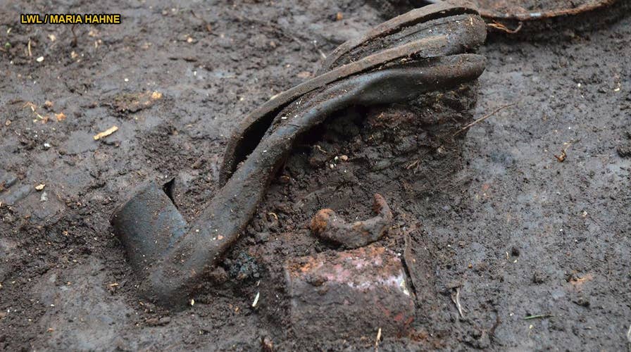 Hundreds of chilling items discovered at Nazi massacre sites