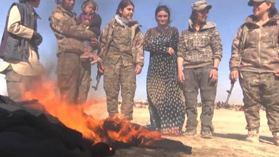 Yazidi Sex Slaves Set Fire To Their Burqas After Being