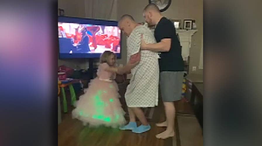 Alzheimer's patient dances with his 3-year-old granddaughter