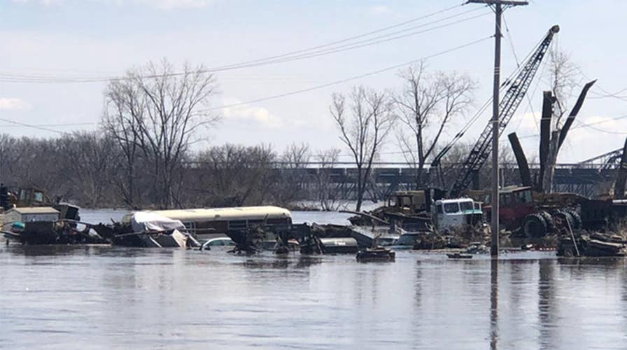 Flooding in midwest states causes devastation for miles