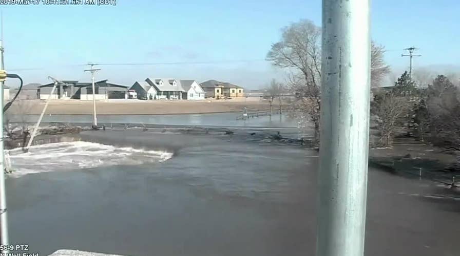 Water from Thomas Lake floods the city of Lincoln, Nebraska