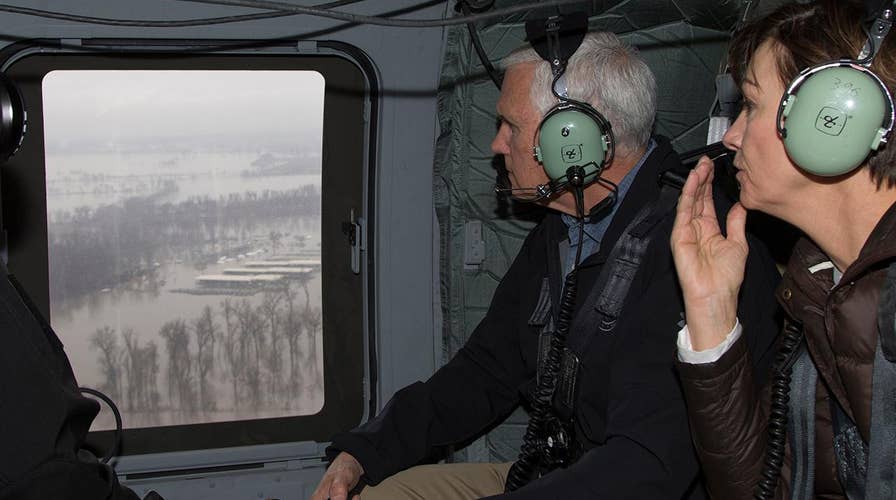 Pence promises help is on the way for flood-hit towns in Midwest