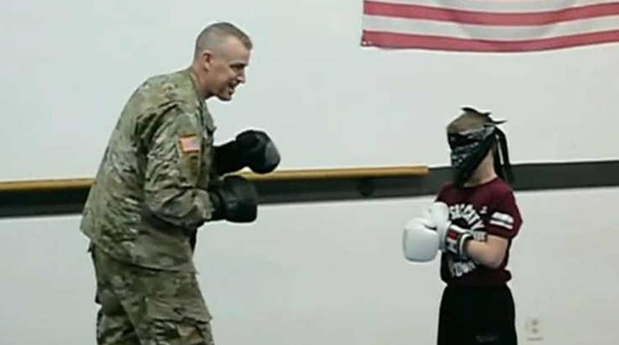 Boy realizes Taekwondo sparring partner is his dad back from deployment