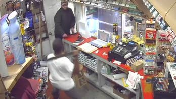WATCH: Store clerk's machete fends off knife-wielding robbery suspects