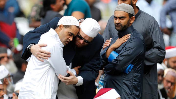 New Zealanders pause to observe two minutes of silence